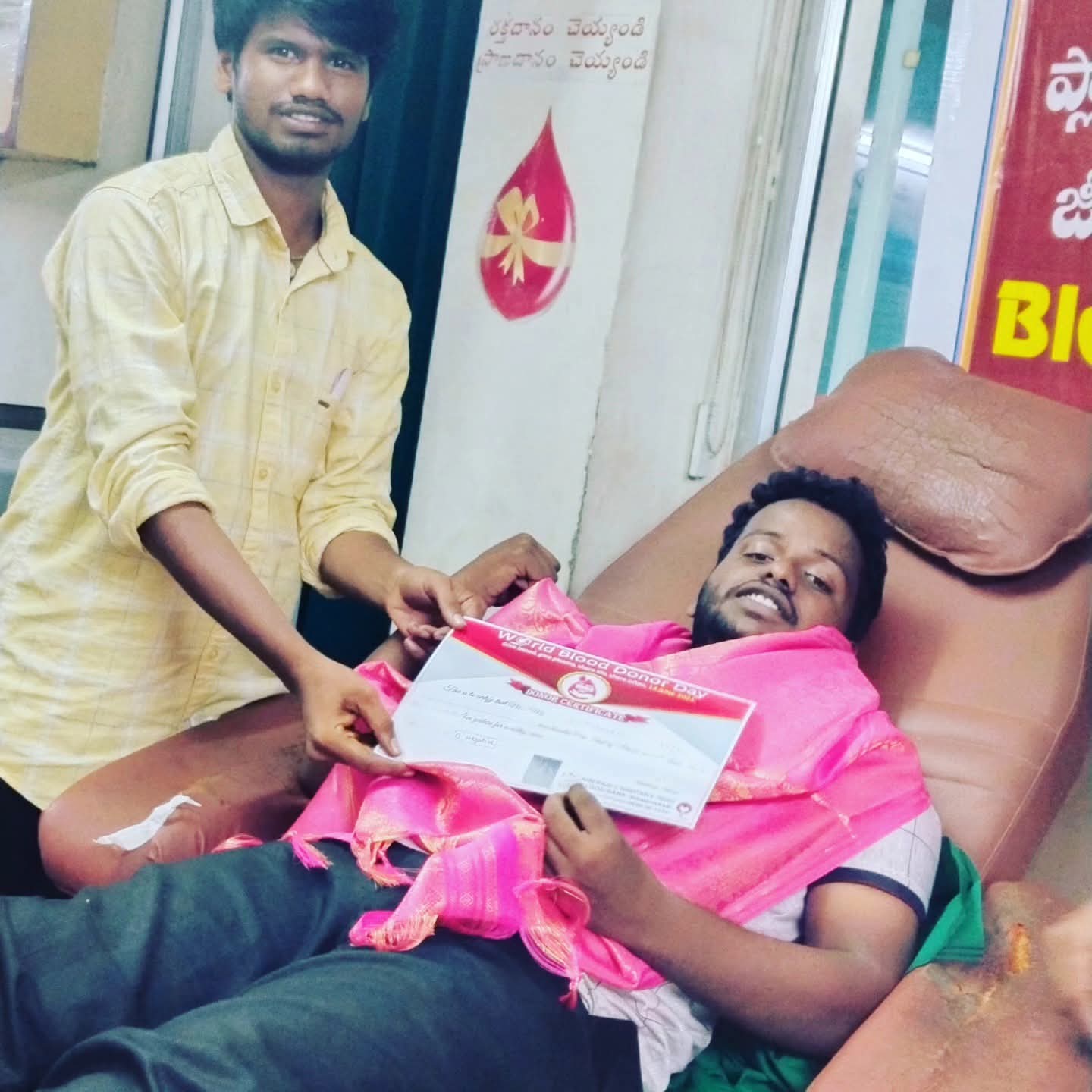Donor receiving appreciation after donating blood